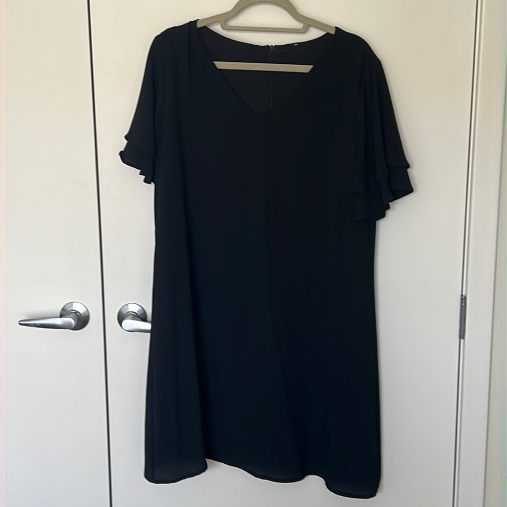 Black dress with ruffled sleeves